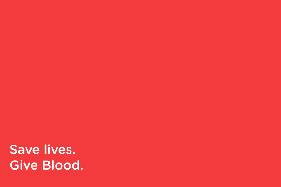 "Save lives. Give Blood" white text on red background. 