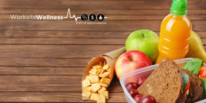 Grapes and Sandwhich in a plastic container with an orange drink and apples
