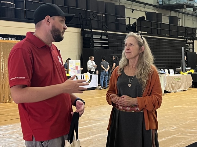 Two employees discussing counseling for faculty and staff